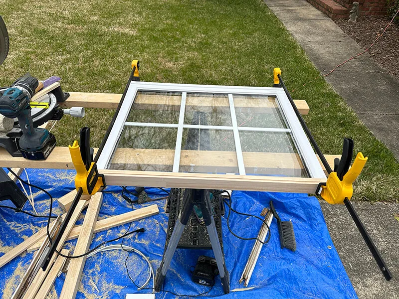 Window frame secured for professional repair in Broward County, Florida